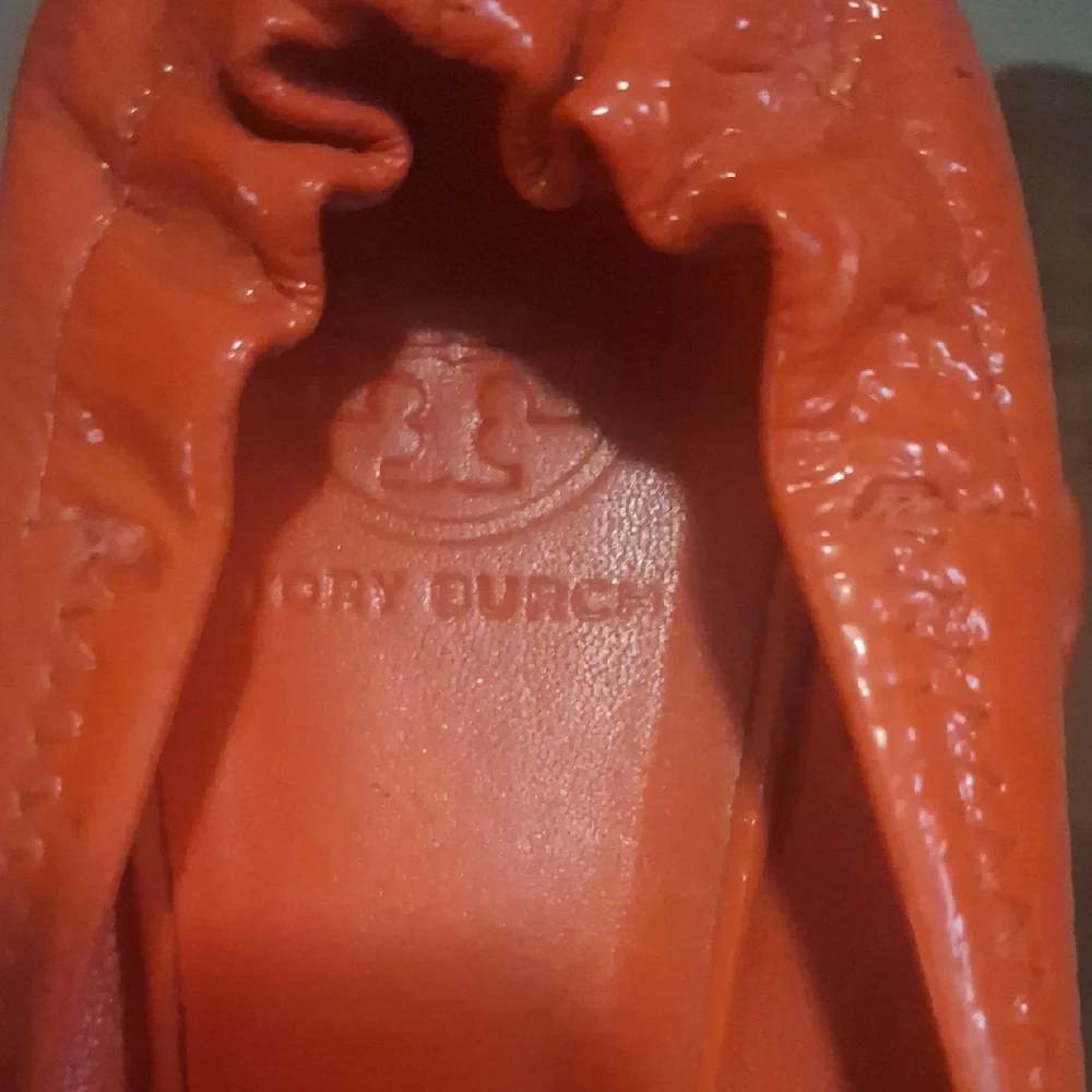 Tory Burch Women's Bright Orange Flats with Gold Emblem - Picture 3 of 3